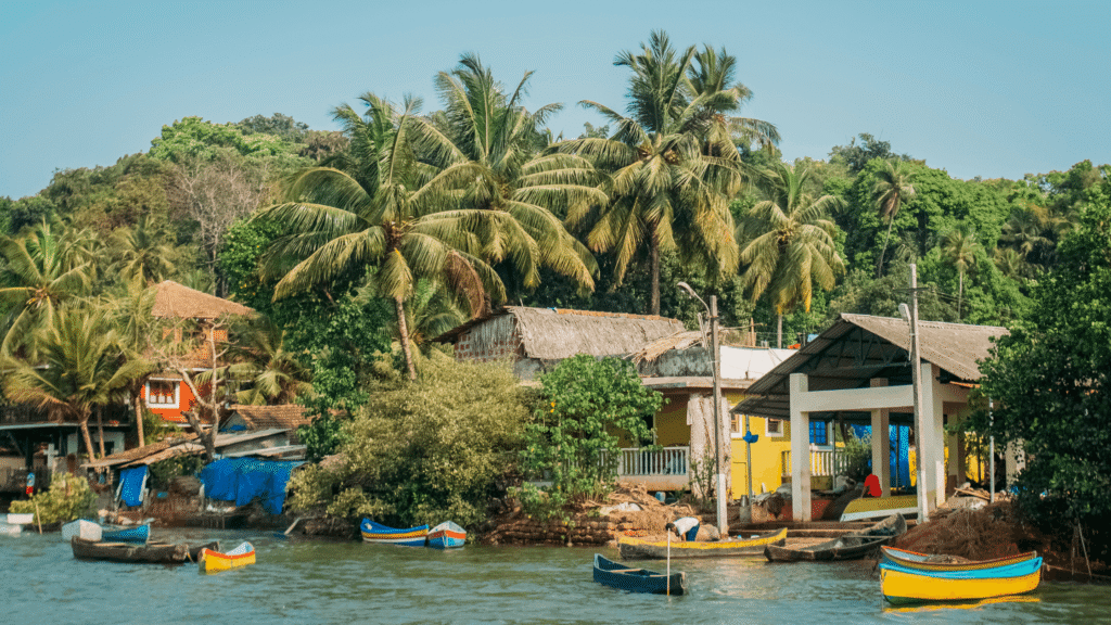 Honeymoon couple enjoying a peaceful Goa beach at sunset, showing why the best time to visit Goa for honeymoon matters for a romantic experience